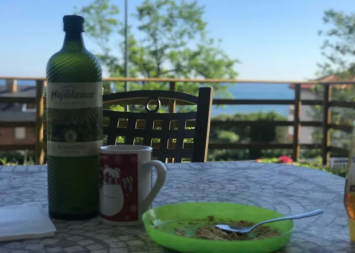 아파트 Casa De Flores - Con Jardin Privado Frente A La Playa De 코밀라스